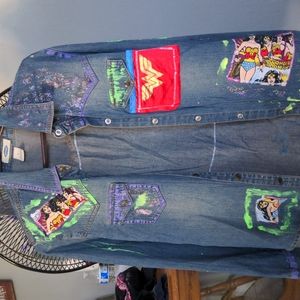 Blue jean jacket with Wonder woman on the front and Superman on the back